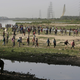 Migrants at Yamuna river bank in Delhi